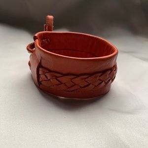 Boho orange leather adjustable cuff with woven detail